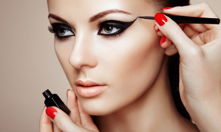 Makeup Artist Applies Eye Shadow